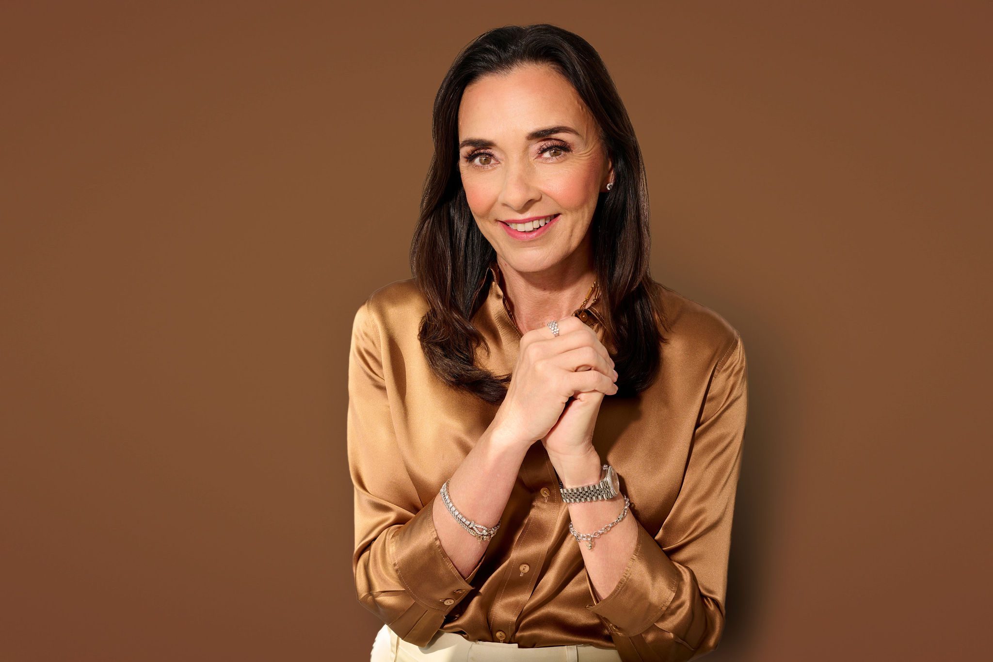 Angela Cusack in a bronze shirt